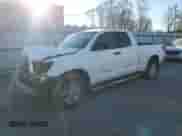 2012 Toyota Tundra z VIN 5TFRU5F1XCX027582, wystawiony jako Copart lot #85649634 z przebiegiem 267 030 mil mil oraz Szkoda całkowita • Salvage title. Historia ofert i sprzedaży dostępna na DreamBid. Obrazek 1.