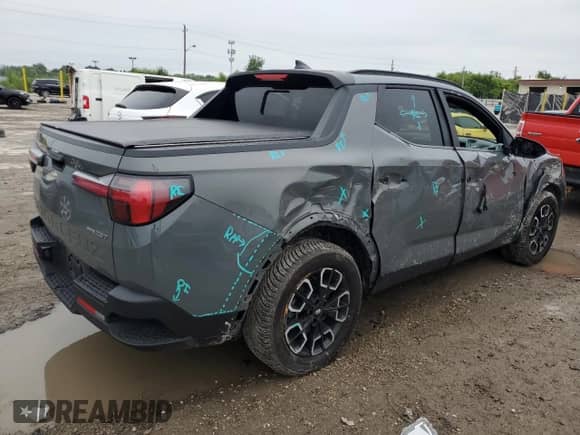 2022 Hyundai Santa Cruz SEL Premium с VIN 5NTJDDAF1NH005206, выставлен на аукционе Copart как лот 67299175 с пробегом 65 834 миль миль и Списание • Salvage title. История ставок и продаж доступна на DreamBid. Изображение 3.