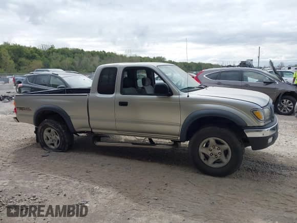 2002 Toyota Tacoma z VIN 5TEWN72N12Z127288, wystawiony jako IAAI lot #43390099 z przebiegiem 249 449 mil mil oraz . Historia ofert i sprzedaży dostępna na DreamBid. Obrazek 13.