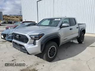 2024 Toyota Tacoma TRD Off Road with VIN 3TMLB5JN6RM029446, listed as a Copart auction lot 86650705 with 27,292 mi miles and Clean title. Bid and sale history available at DreamBid. Image 1.