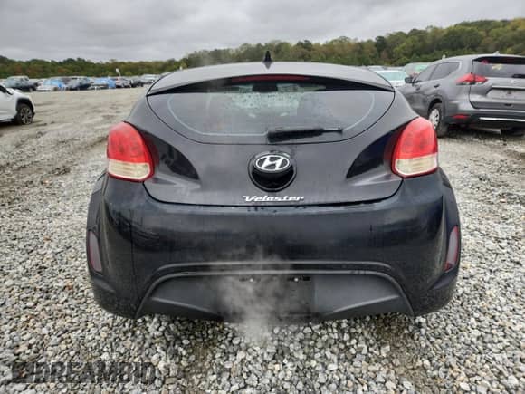 2013 Hyundai Veloster w/Gray Int z VIN KMHTC6AD6DU151914, wystawiony jako Copart lot #90408325 z przebiegiem 95 258 mil mil oraz Czysty tytuł • Clean title. Historia ofert i sprzedaży dostępna na DreamBid. Obrazek 6.