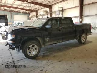 2018 Chevrolet Silverado 1500 LT z VIN 3GCUKREC9JG213996, wystawiony jako Copart lot #70379115 z przebiegiem 104 786 mil mil oraz Szkoda całkowita • Salvage title. Historia ofert i sprzedaży dostępna na DreamBid. Obrazek 1.