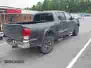 2017 Toyota Tacoma SR5 with VIN 5TFAZ5CN8HX046113, listed as a IAAI auction lot 42706907 with 130,857 mi miles and . Bid and sale history available at DreamBid. Image 4.