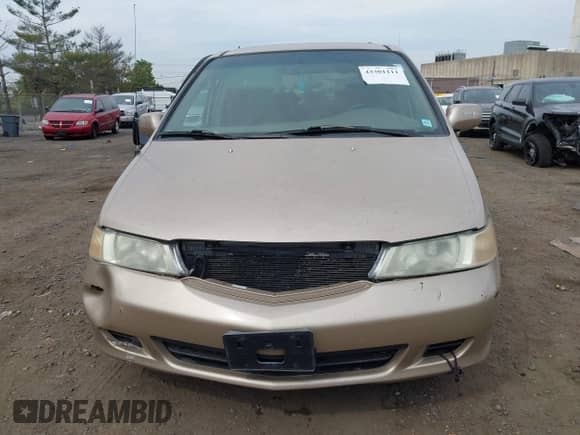 2002 Honda Odyssey EX с VIN 2HKRL18622H556717, выставлен на аукционе IAAI как лот 43301111 с пробегом 255 632 миль миль и . История ставок и продаж доступна на DreamBid. Изображение 12.