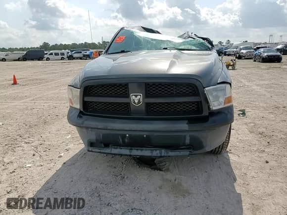 2012 Ram 1500 ST z VIN 3C6JD6DP4CG255194, wystawiony jako Copart lot #59782425 z przebiegiem 102 259 mil mil oraz Szkoda całkowita • Salvage title. Historia ofert i sprzedaży dostępna na DreamBid. Obrazek 13.