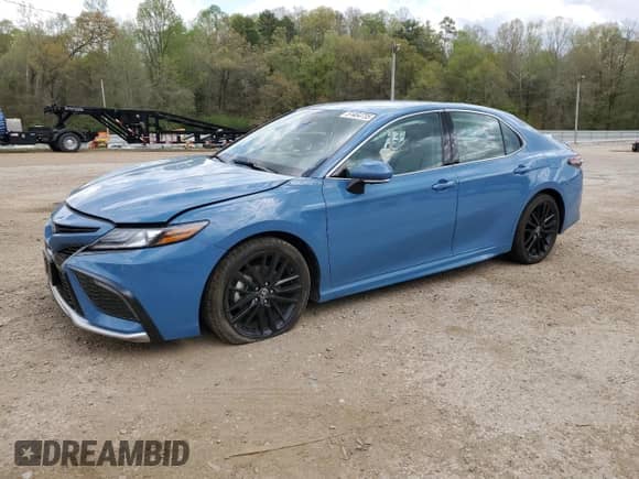 2023 Toyota Camry Hybrid XSE с VIN 4T1K31AK8PU051444, выставлен на аукционе Copart как лот 51464735 с пробегом 15 764 миль миль и Списание • Salvage title. История ставок и продаж доступна на DreamBid. Изображение 1.