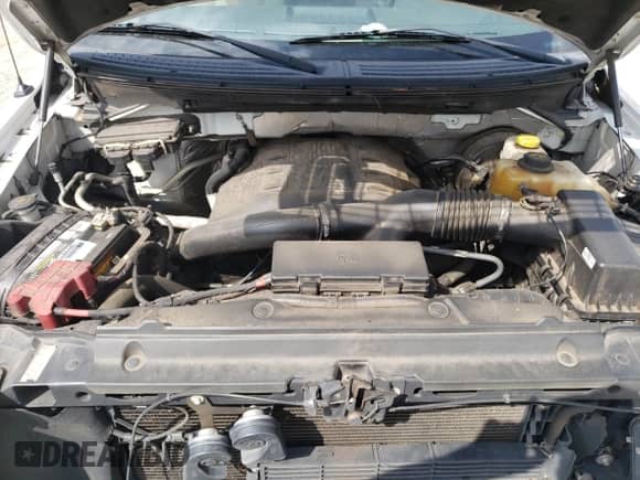 2013 Ford F-150 XL z VIN 1FTFW1CT3DKG39956, wystawiony jako Copart lot #68510334 z przebiegiem 197 460 mil mil oraz Szkoda całkowita • Salvage title. Historia ofert i sprzedaży dostępna na DreamBid. Obrazek 13.