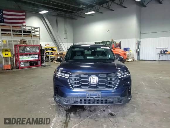 2025 Honda Pilot Sport с VIN 5FNYG1H36SB060968, выставлен на аукционе Copart как лот 69057985 с пробегом 5 450 миль миль и Списание • Salvage title. История ставок и продаж доступна на DreamBid. Изображение 14.
