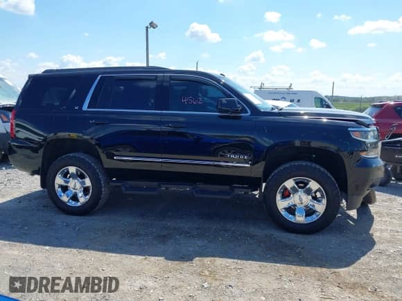 2018 Chevrolet Tahoe LT with VIN 1GNSKBKC7JR156188, listed as a IAAI auction lot 43114562 with 149,298 mi miles and . Bid and sale history available at DreamBid. Image 13.
