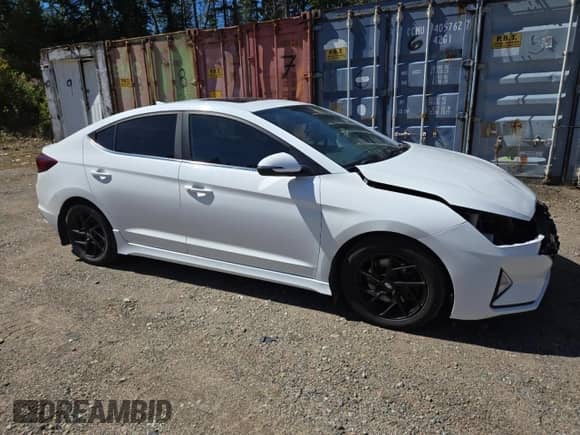 2020 Hyundai Elantra Sport z VIN KMHD04LBXLU070409, wystawiony jako Copart lot #69004755 z przebiegiem 160 828 mil mil oraz Szkoda całkowita • Salvage title. Historia ofert i sprzedaży dostępna na DreamBid. Obrazek 4.