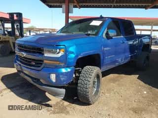 2018 Chevrolet Silverado 1500 LT z VIN 3GCUKREC3JG382038, wystawiony jako IAAI lot #43220792 z przebiegiem 101 358 mil mil oraz . Historia ofert i sprzedaży dostępna na DreamBid. Obrazek 6.
