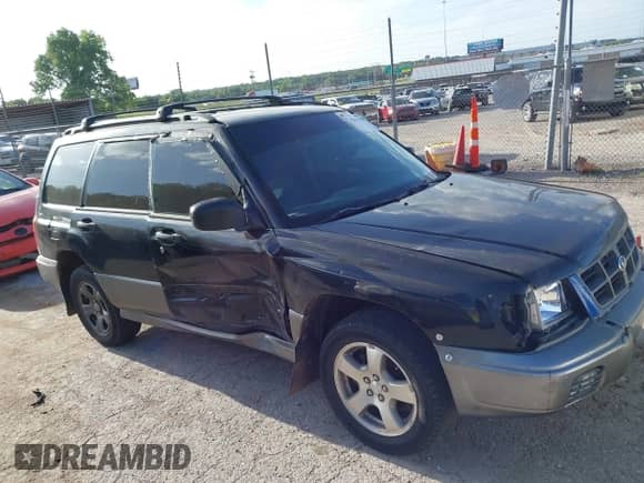 1999 Subaru Forester S with VIN JF1SF6552XH736647, listed as a IAAI auction lot 42565079 with 215,244 mi miles and . Bid and sale history available at DreamBid. Image 13.