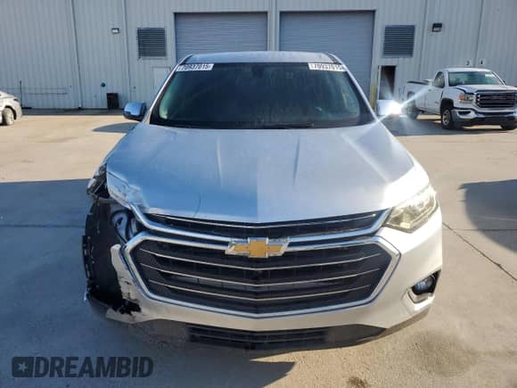 2019 Chevrolet Traverse LS with VIN 1GNERFKW3KJ144131, listed as a Copart auction lot 70937015 with 71,755 mi miles and Salvage title. Bid and sale history available at DreamBid. Image 5.