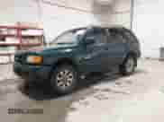 1998 Honda Passport LX with VIN 4S6CM58W9W4419797, listed as a IAAI auction lot 42425697 with 158,562 mi miles and . Bid and sale history available at DreamBid. Image 2.