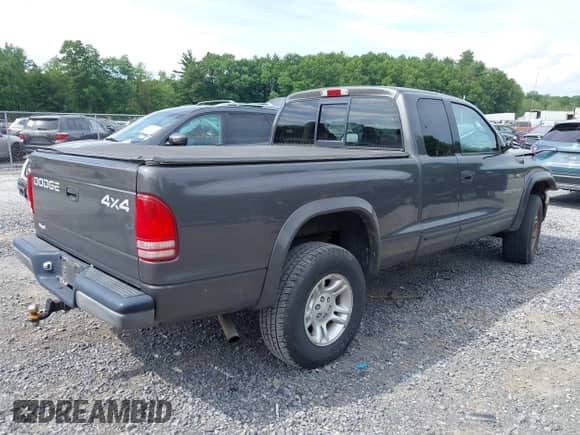 2001 Dodge Dakota with VIN 1B7GG22X21S299349, listed as a IAAI auction lot 42622415 with 92,940 mi miles and . Bid and sale history available at DreamBid. Image 4.