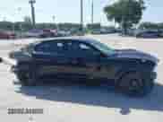 2021 Dodge Charger Scat Pack Widebody with VIN 2C3CDXGJ9MH561070, listed as a IAAI auction lot 42824700 with 62,984 mi miles and . Bid and sale history available at DreamBid. Image 14.