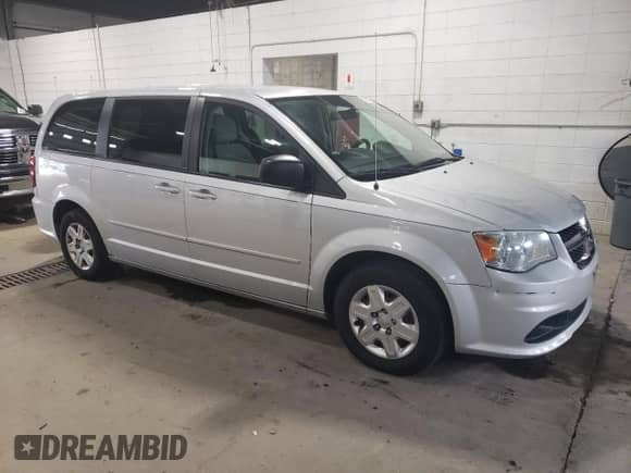 2012 Dodge Grand Caravan American Value z VIN 2C4RDGBGXCR105234, wystawiony jako Copart lot #69327725 z przebiegiem 141 911 mil mil oraz Szkoda całkowita • Salvage title. Historia ofert i sprzedaży dostępna na DreamBid. Obrazek 4.