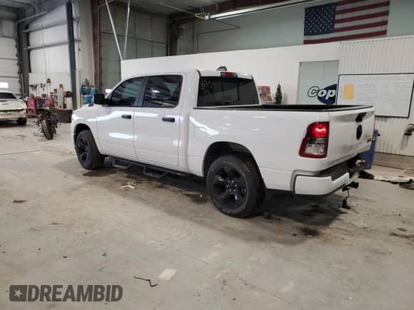 2023 Ram 1500 Tradesman с VIN 1C6RRFGG2PN631338, выставлен на аукционе Copart как лот 87486334 с пробегом 8 744 миль миль и Списание • Salvage title. История ставок и продаж доступна на DreamBid. Изображение 2.