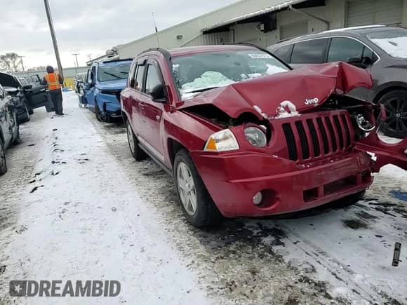 2010 Jeep Compass Latitude z VIN 1J4NF1FB0AD623710, wystawiony jako Copart lot #88657615 z przebiegiem Nie podano mil oraz Szkoda całkowita • Salvage title. Historia ofert i sprzedaży dostępna na DreamBid. Obrazek 12.