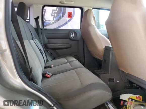 2007 Dodge Nitro SXT with VIN 1D8GT28K57W596531, listed as a Copart auction lot 66501035 with 163,914 mi miles and Salvage title. Bid and sale history available at DreamBid. Image 10.