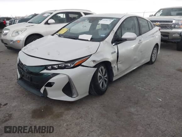 2018 Toyota Prius Plus z VIN JTDKARFP0J3084142, wystawiony jako IAAI lot #41936736 z przebiegiem 50 699 mil mil oraz . Historia ofert i sprzedaży dostępna na DreamBid. Obrazek 2.