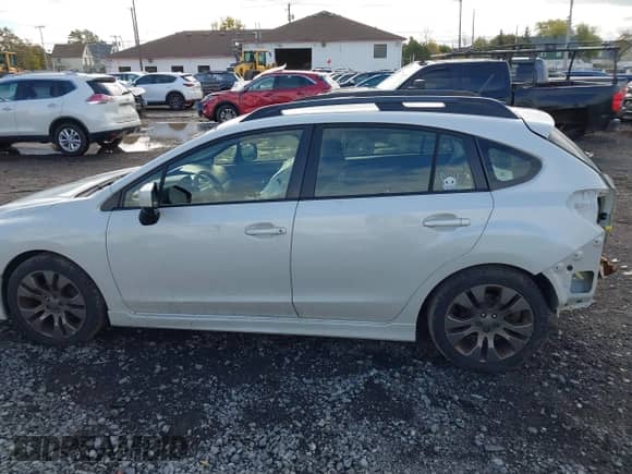 2014 Subaru Impreza Special Sports Premium z VIN JF1GPAL6XEH335023, wystawiony jako IAAI lot #43531728 z przebiegiem 148 295 mil mil oraz . Historia ofert i sprzedaży dostępna na DreamBid. Obrazek 14.