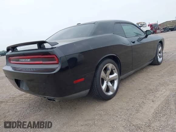 2013 Dodge Challenger R/T with VIN 2C3CDYBTXDH653559, listed as a IAAI auction lot 42304148 with 84,796 mi miles and . Bid and sale history available at DreamBid. Image 4.