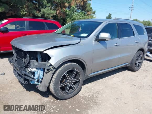 2016 Dodge Durango Limited with VIN 1C4RDHDG8GC476863, listed as a IAAI auction lot 43147056 with 196,574 mi miles and . Bid and sale history available at DreamBid. Image 2.