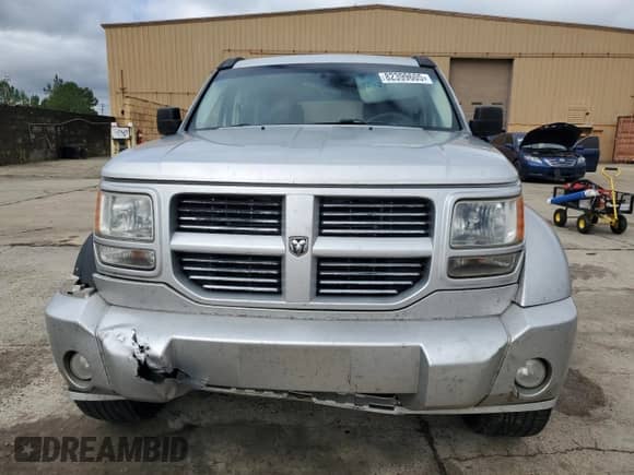 2011 Dodge Nitro Heat with VIN 1D4PT4GK8BW597552, listed as a Copart auction lot 82399605 with 262,822 mi miles and Salvage title. Bid and sale history available at DreamBid. Image 5.