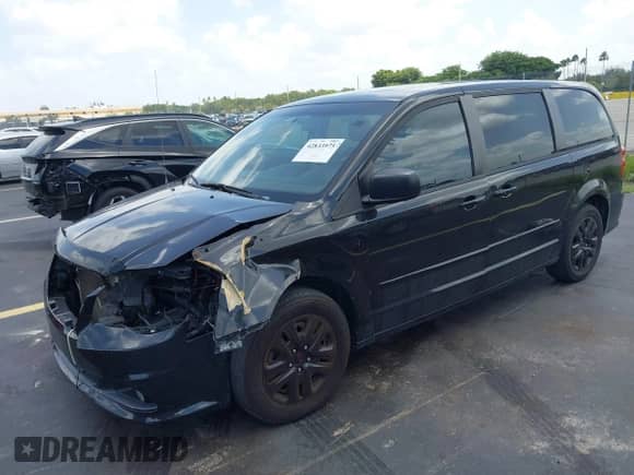2014 Dodge Grand Caravan SE with VIN 2C4RDGBG5ER381162, listed as a IAAI auction lot 42833975 with 110,648 mi miles and . Bid and sale history available at DreamBid. Image 18.