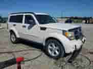2007 Dodge Nitro SXT with VIN 1D8GT28K17W727700, listed as a Copart auction lot 83789135 with 150,618 mi miles and Salvage title. Bid and sale history available at DreamBid. Image 4.