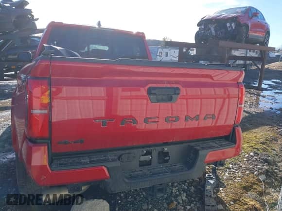2024 Toyota Tacoma SR5 with VIN 3TYLB5JN1RT001686, listed as a IAAI auction lot 41071582 with 5,986 mi miles and . Bid and sale history available at DreamBid. Image 17.