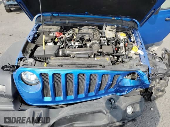 2023 Jeep Wrangler Sport S with VIN 1C4HJXDG7PW677814, listed as a Copart auction lot 67802085 with 28,546 mi miles and Salvage title. Bid and sale history available at DreamBid. Image 12.