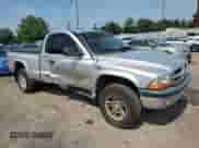 2001 Dodge Dakota Sport с VIN 1B7GG22N01S152414, выставлен на аукционе Copart как лот 66342335 с пробегом 147 060 миль миль и Списание • Salvage title. История ставок и продаж доступна на DreamBid. Изображение 4.