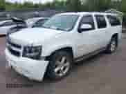 2010 Chevrolet Suburban LT with VIN 1GNUKJE32AR113764, listed as a IAAI auction lot 43277102 with 297,432 mi miles and . Bid and sale history available at DreamBid. Image 2.