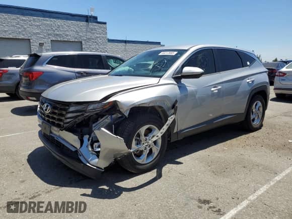 2022 Hyundai Tucson SE with VIN KM8JA3AEXNU018918, listed as a Copart auction lot 66412885 with 34,253 mi miles and Salvage title. Bid and sale history available at DreamBid. Image 1.
