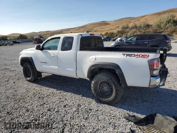 2022 Toyota Tacoma SR z VIN 3TYSZ5ANXNT090384, wystawiony jako Copart lot #80906685 z przebiegiem Nie podano mil oraz Szkoda całkowita • Salvage title. Historia ofert i sprzedaży dostępna na DreamBid. Obrazek 2.