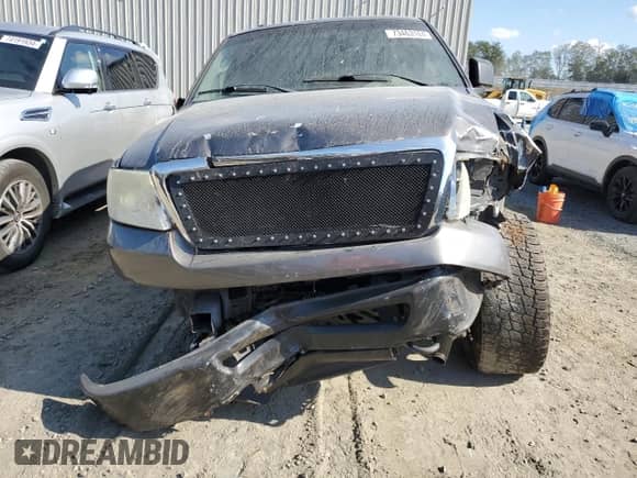 2007 Ford F-150 XL with VIN 1FTRF14V37KC39137, listed as a Copart auction lot 73463164 with 150,331 mi miles and Salvage title. Bid and sale history available at DreamBid. Image 5.