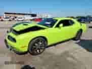 2023 Dodge Challenger SXT with VIN 2C3CDZAG3PH554144, listed as a Copart auction lot 70311265 with 55,494 mi miles and Salvage title. Bid and sale history available at DreamBid. Image 1.