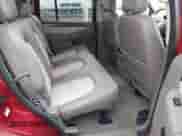 2003 Ford Explorer Eddie Bauer z VIN 1FMDU74K03UC30186, wystawiony jako IAAI lot #42373893 z przebiegiem 103 172 mil mil oraz . Historia ofert i sprzedaży dostępna na DreamBid. Obrazek 8.