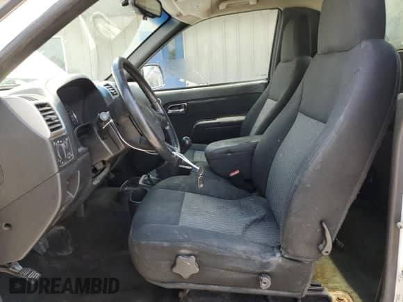 2009 Chevrolet Colorado Work Truck with VIN 1GCCS149498157292, listed as a Copart auction lot 52050565 with 166,408 mi miles and Salvage title. Bid and sale history available at DreamBid. Image 7.