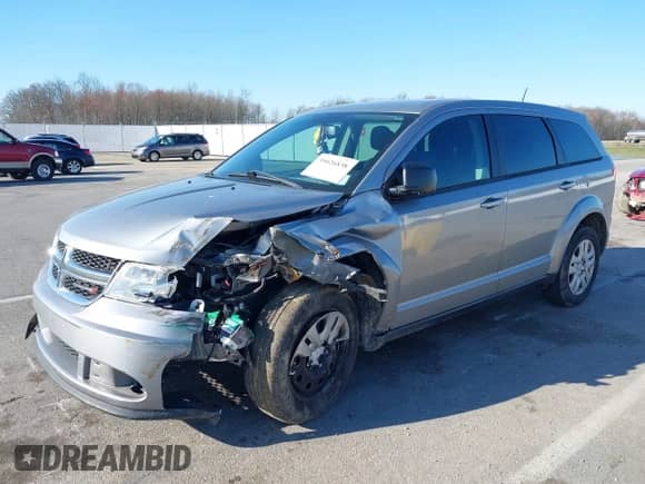 2015 Dodge Journey SE with VIN 3C4PDCAB9FT542634, listed as a IAAI auction lot 39026838 with 127,136 mi miles and . Bid and sale history available at DreamBid. Image 2.