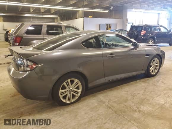 2007 Hyundai Tiburon GS with VIN KMHHM66D17U258112, listed as a Copart auction lot 60286334 with 117,735 mi miles and Salvage title. Bid and sale history available at DreamBid. Image 3.
