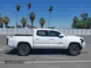 2020 Toyota Tacoma SR5 with VIN 5TFAZ5CN3LX093798, listed as a IAAI auction lot 42212050 with 85,632 mi miles and . Bid and sale history available at DreamBid. Image 14.