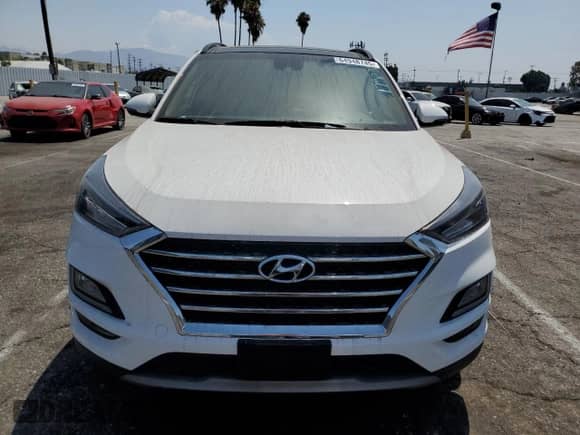 2020 Hyundai Tucson Sport with VIN KM8J33AL0LU259621, listed as a Copart auction lot 64948745 with 33,889 mi miles and Clean title. Bid and sale history available at DreamBid. Image 5.