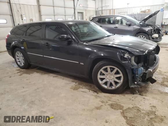 2006 Dodge Magnum with VIN 2D4FV47VX6H179997, listed as a Copart auction lot 44908965 with 148,864 mi miles and Salvage title. Bid and sale history available at DreamBid. Image 4.