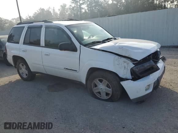 2002 Chevrolet TrailBlazer LTZ with VIN 1GNDS13S522213636, listed as a Copart auction lot 82784704 with Not provided miles and Salvage title. Bid and sale history available at DreamBid. Image 4.