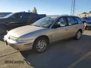 1999 Saturn SW with VIN 1G8ZK8271XZ368987, listed as a Copart auction lot 82610964 with 222,100 mi miles and Clean title. Bid and sale history available at DreamBid. Image 1.
