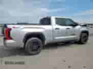 2023 Toyota Tundra SR5 with VIN 5TFLA5DAXPX063117, listed as a Copart auction lot 50590875 with 60,409 mi miles and Salvage title. Bid and sale history available at DreamBid. Image 3.