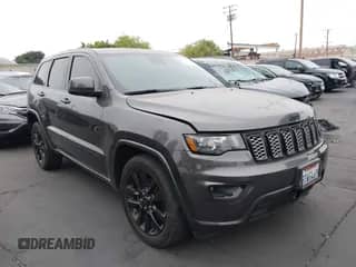 2021 Jeep Grand Cherokee Laredo E with VIN 1C4RJEAGXMC551506, listed as a IAAI auction lot 42715133 with 71,667 mi miles and . Bid and sale history available at DreamBid. Image 1.